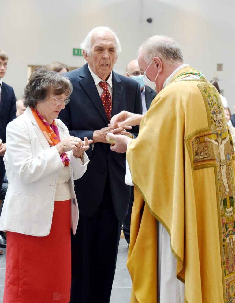 Individual couples get their rings blessed