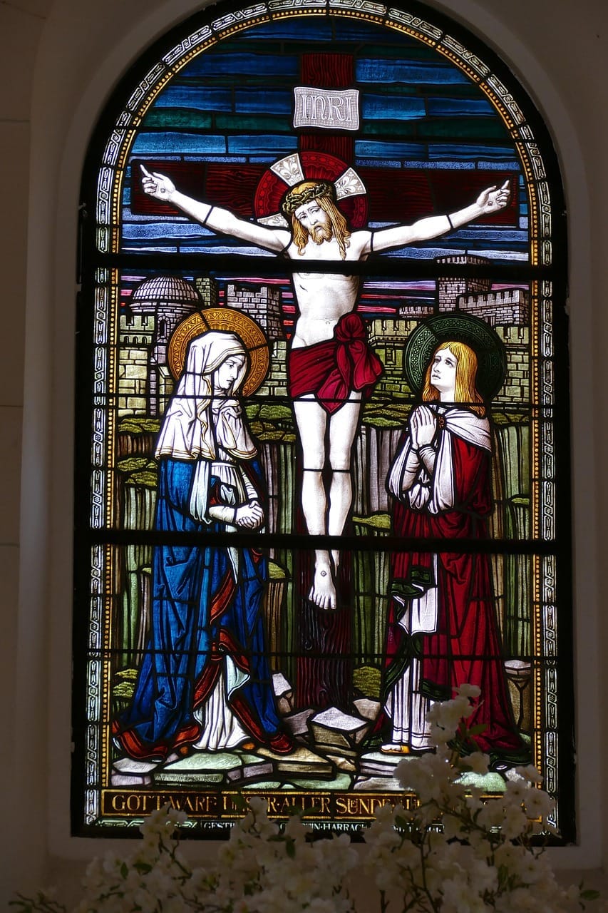Jesus crucified with two women by his feet (Mary, his mother, being one of them)
